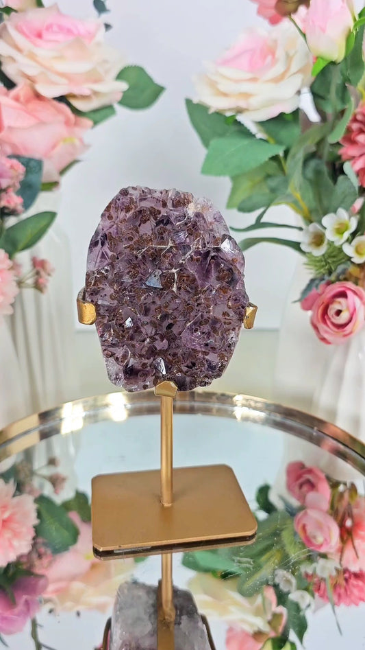 Amethyst with golden sugary inclusions on Stand